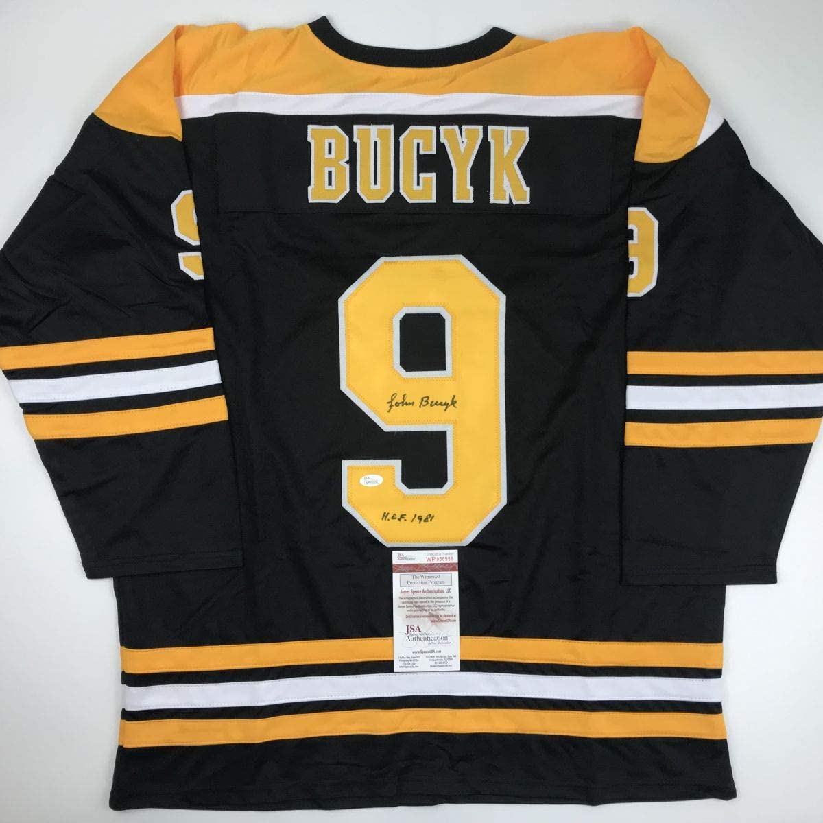 Autographed/Signed Johnny John Bucyk HOF 1981 Boston Black Hockey Jersey JSA COA