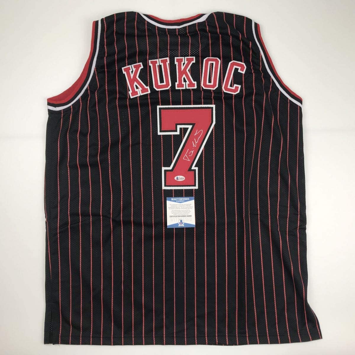 Autographed/Signed Toni Kukoc Chicago Black Pinstripe Basketball Jersey Beckett BAS COA