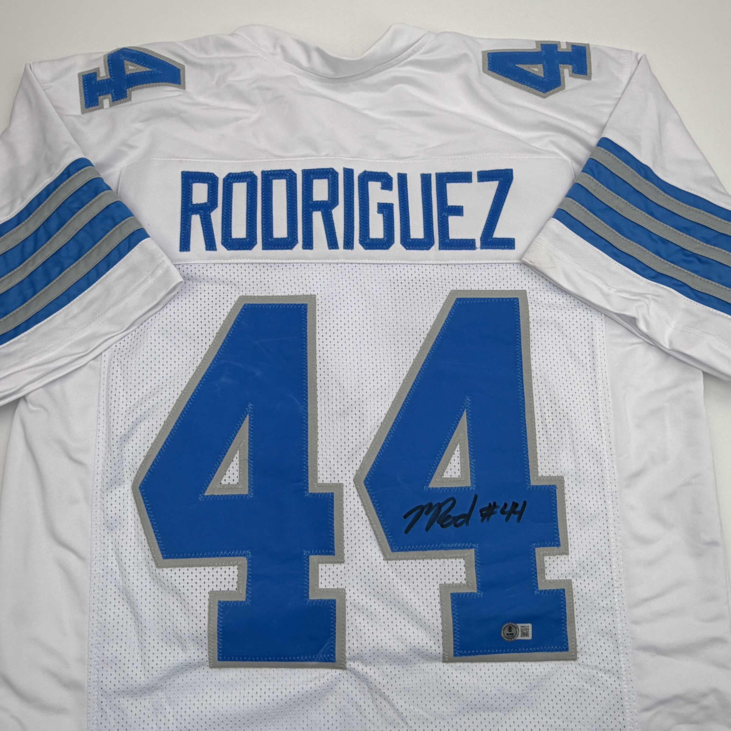 Autographed/Signed Malcolm Rodriguez Detroit White Football Jersey Beckett BAS COA