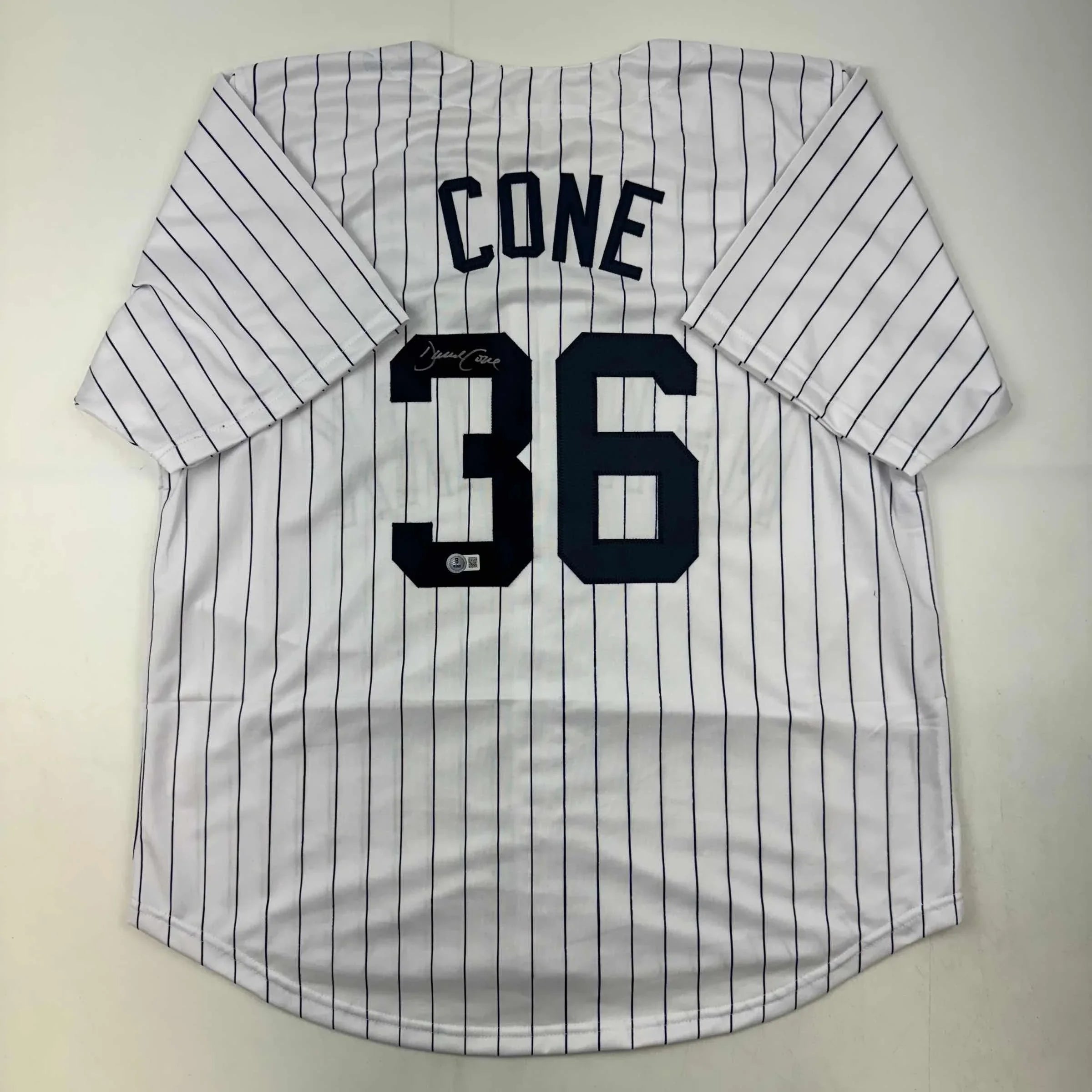 Autographed/Signed David Cone New York Pinstripe Baseball Jersey Beckett BAS COA
