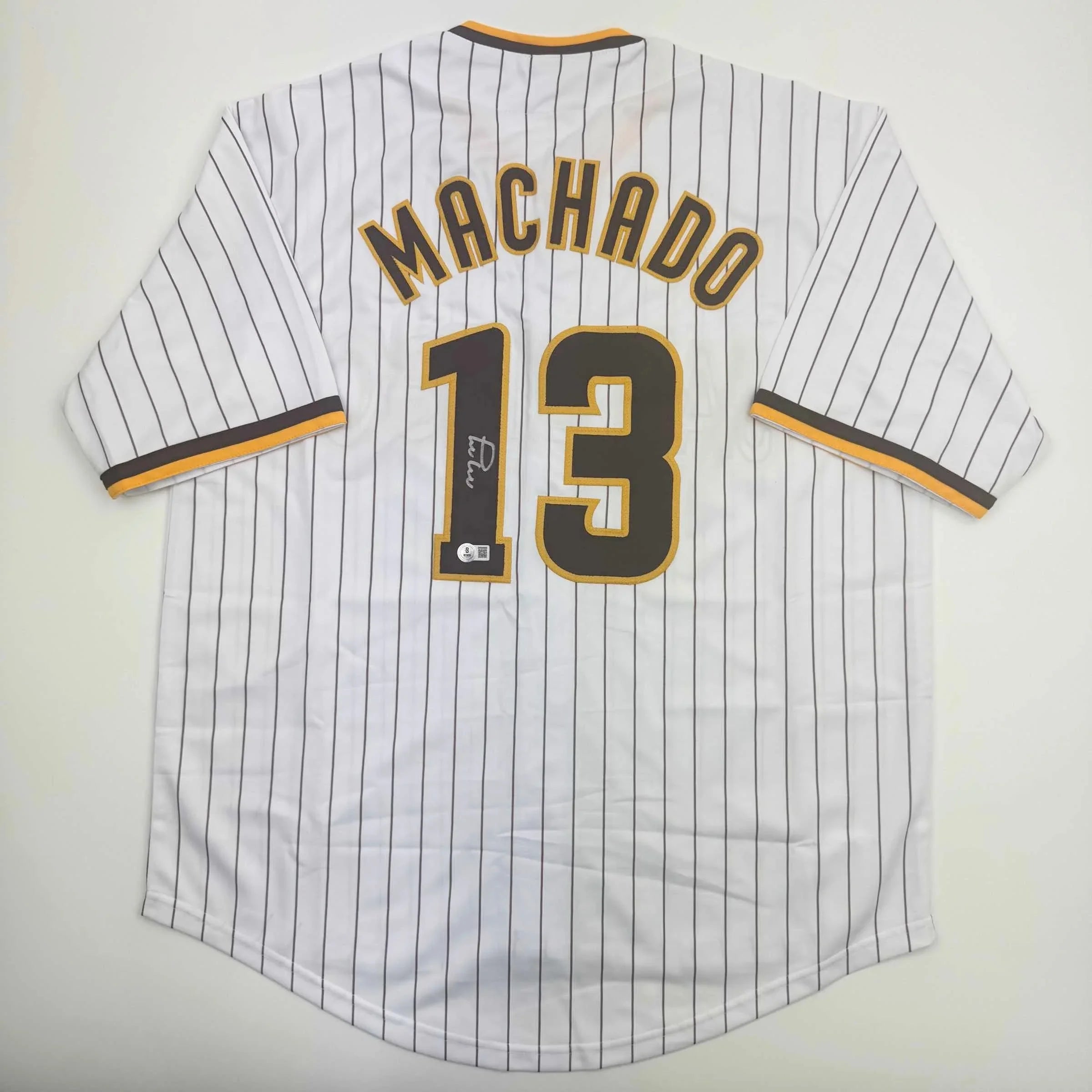 Autographed/Signed Manny Machado San Diego Pinstripe Baseball Jersey Beckett BAS COA