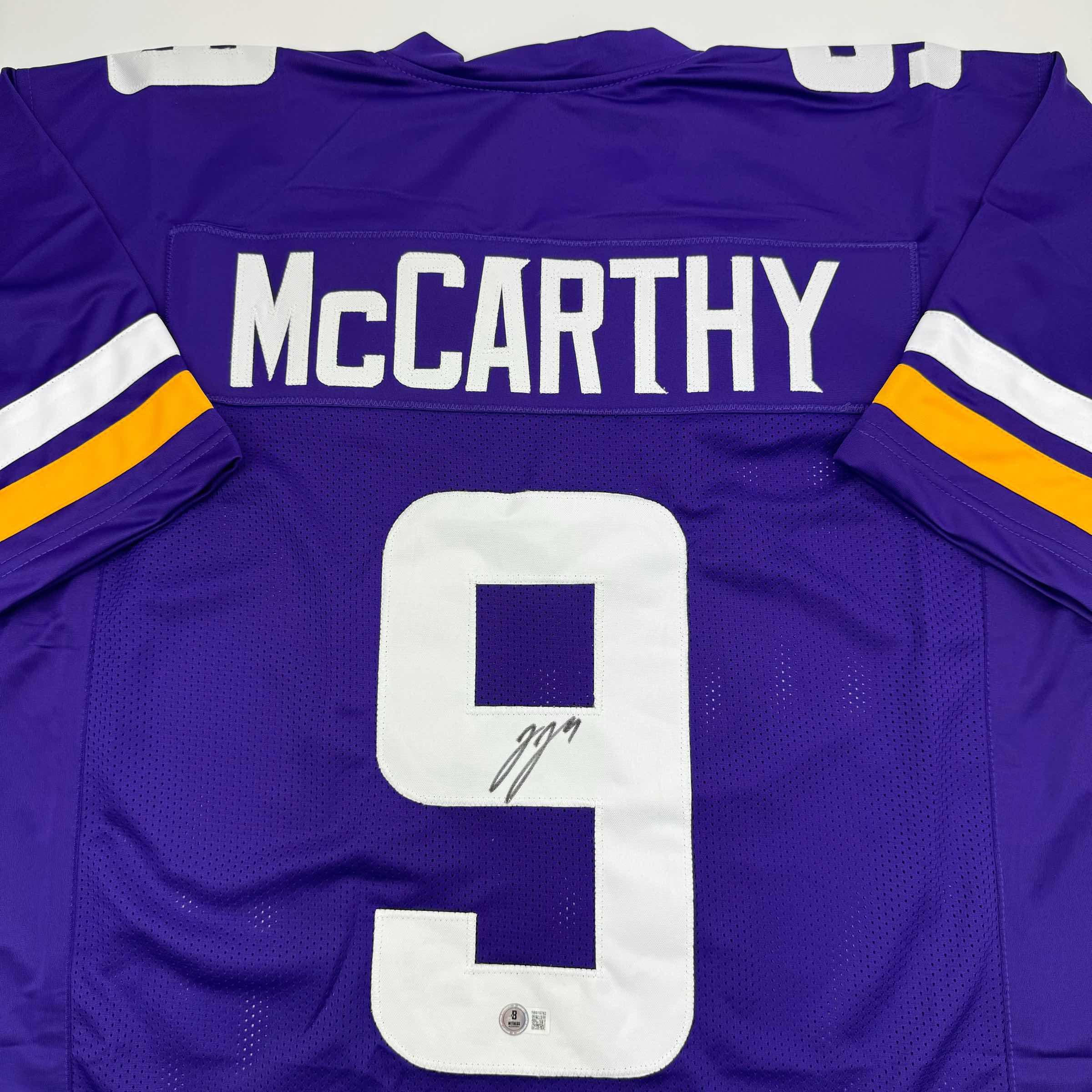 Autographed/Signed J.J. JJ McCarthy Minnesota Purple Football Jersey Beckett BAS COA