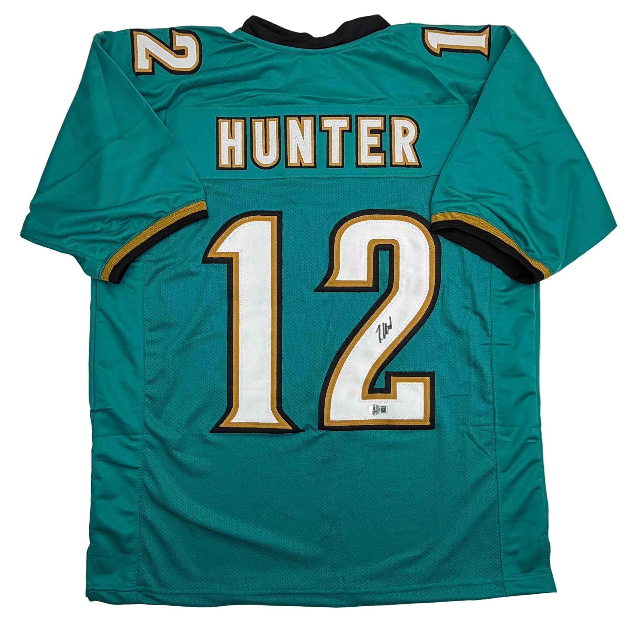 Autographed/Signed Travis Hunter Jacksonville Teal Retro Football Jersey Beckett BAS COA