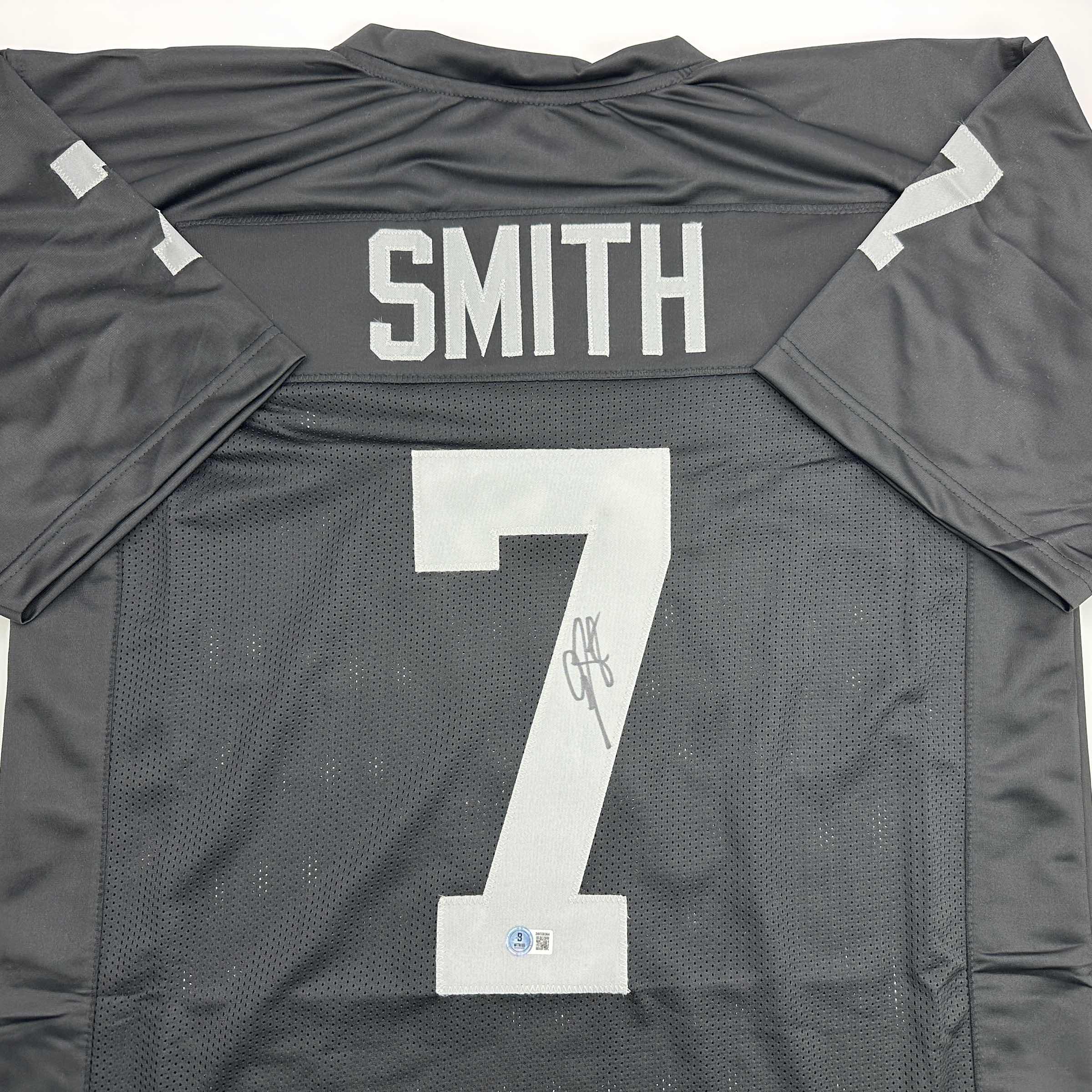Autographed/Signed Geno Smith Oakland Black Football Jersey Beckett BAS COA