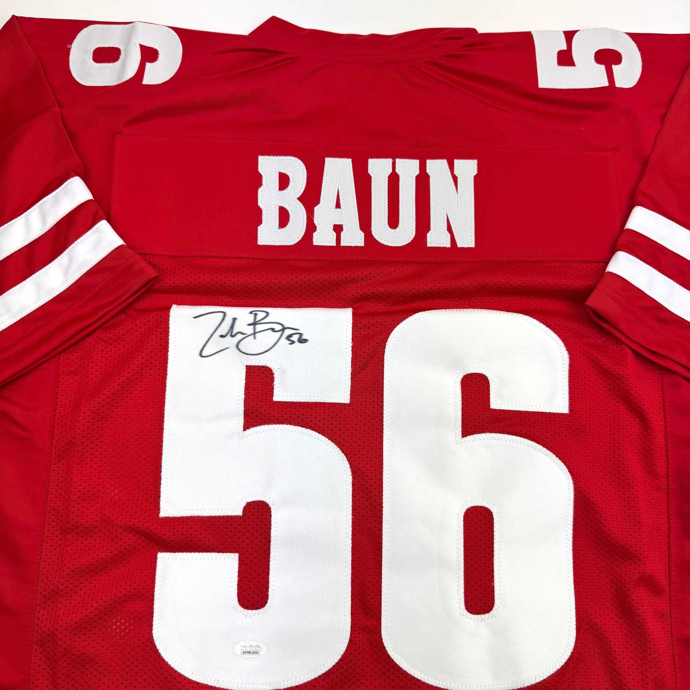 Autographed/Signed Zack Baun Wisconsin Red College Football Jersey JSA COA