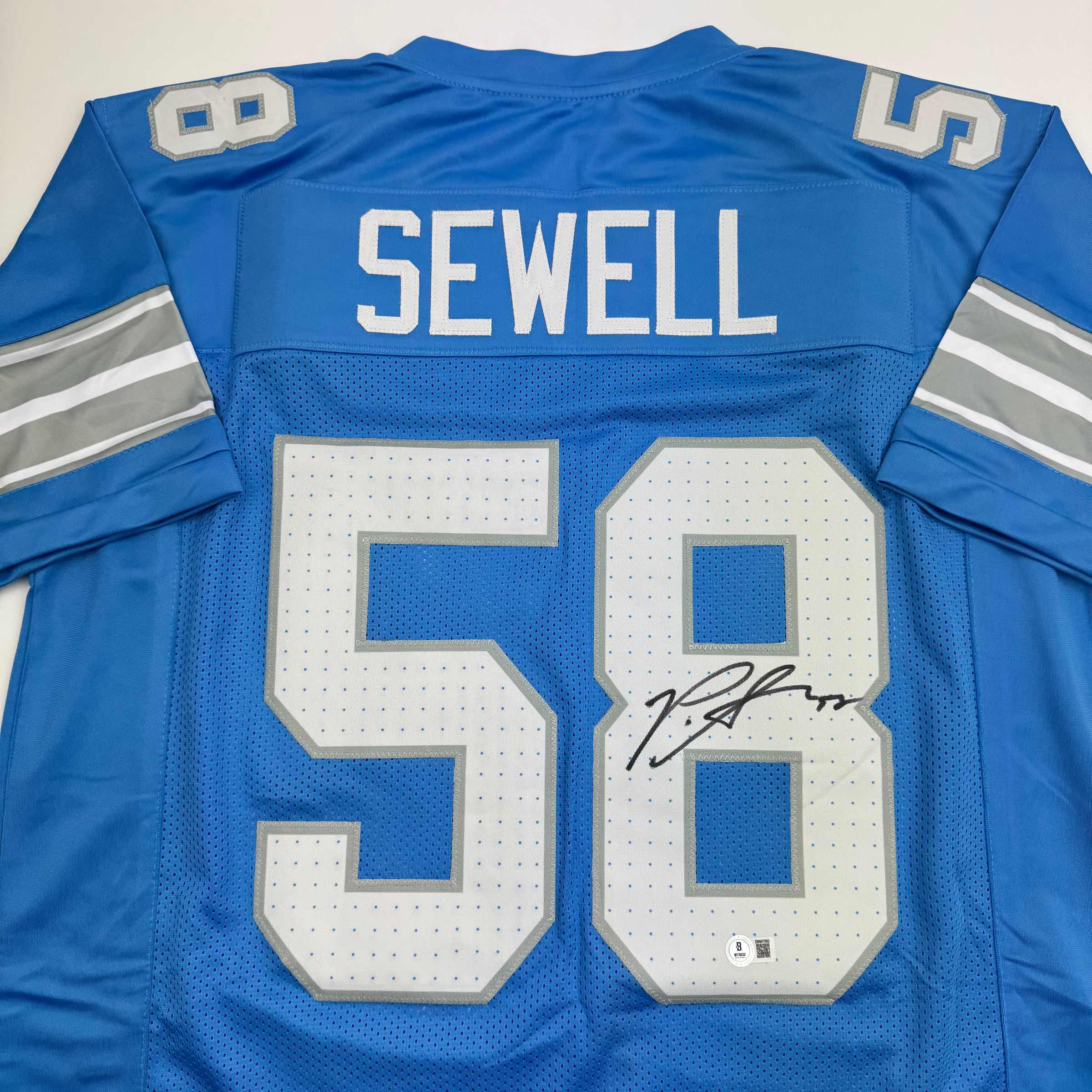 Autographed/Signed Penei Sewell Detroit Blue Current Football Jersey Beckett BAS COA